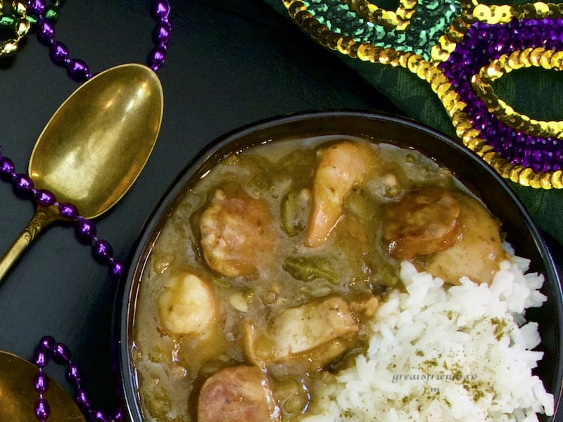 Overhead shot of Gumbo in a black bowl.