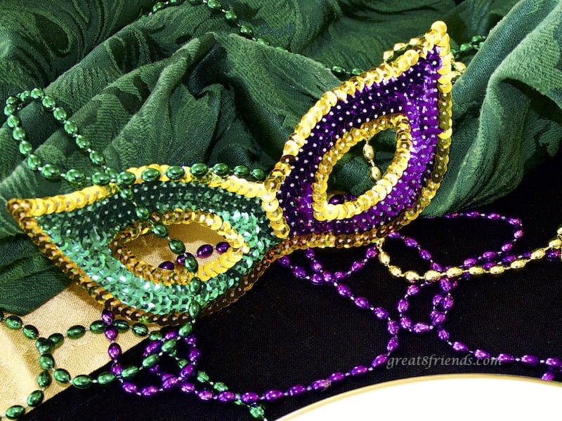 Mardi Gras Mask and beads.