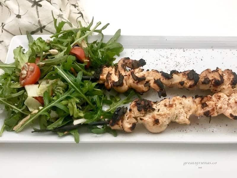 Middle East Grilled Lemon Yogurt Chicken skewers served with an arugula salad