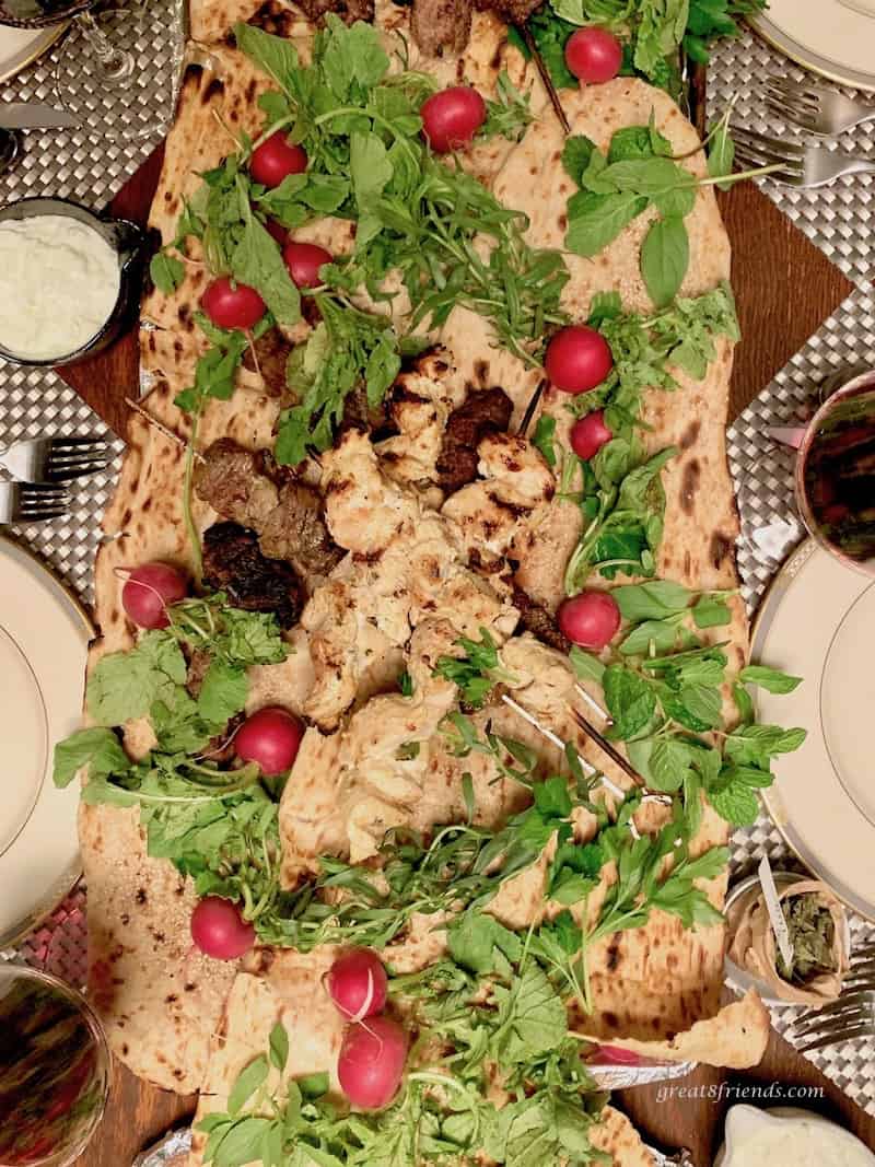 Middle East Grilled Lemon Yogurt Chicken skewers served at a dinner party.