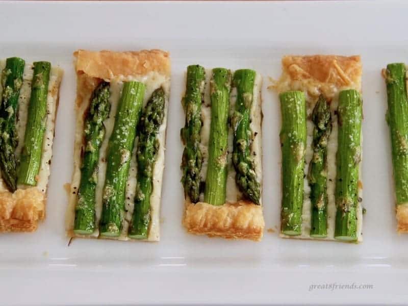 Asparagus Gruyere Tart cut into small servings.