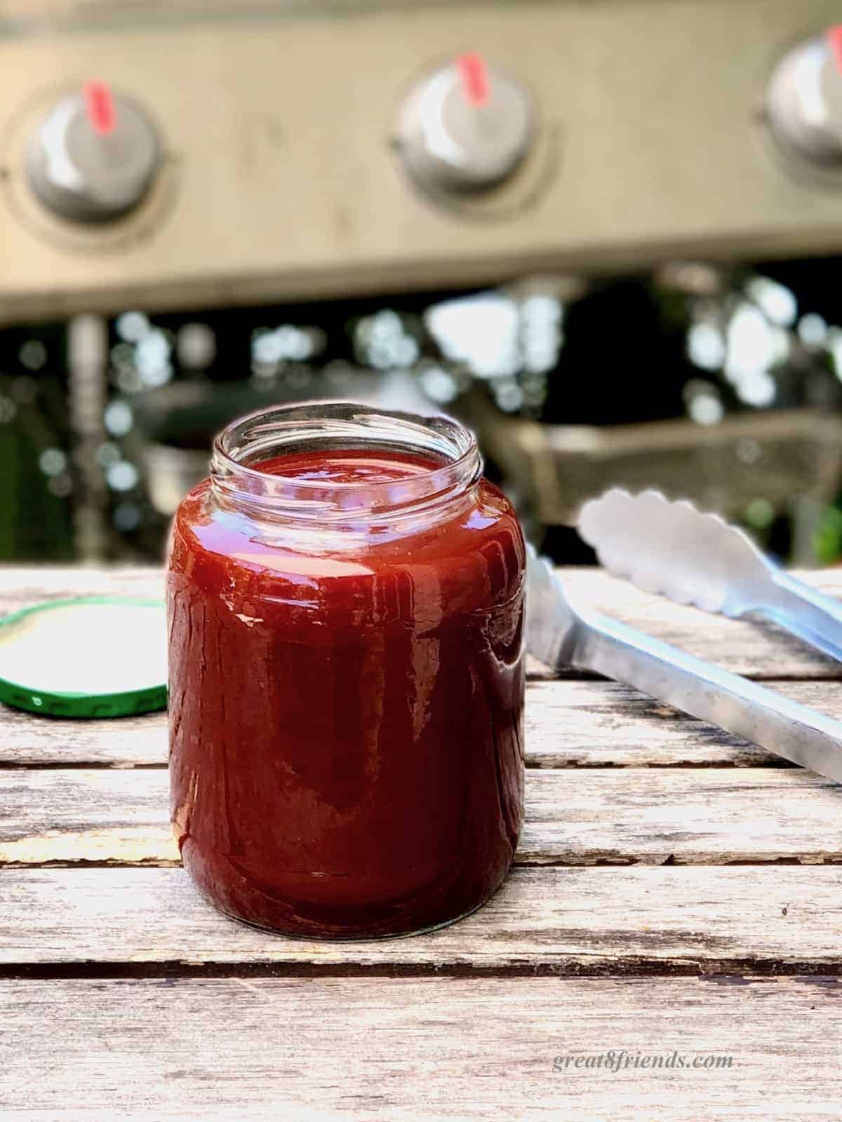 Jar of barbecue sauce.