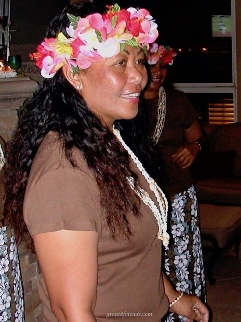 Hawaiian hula instructor with a lei around her head.