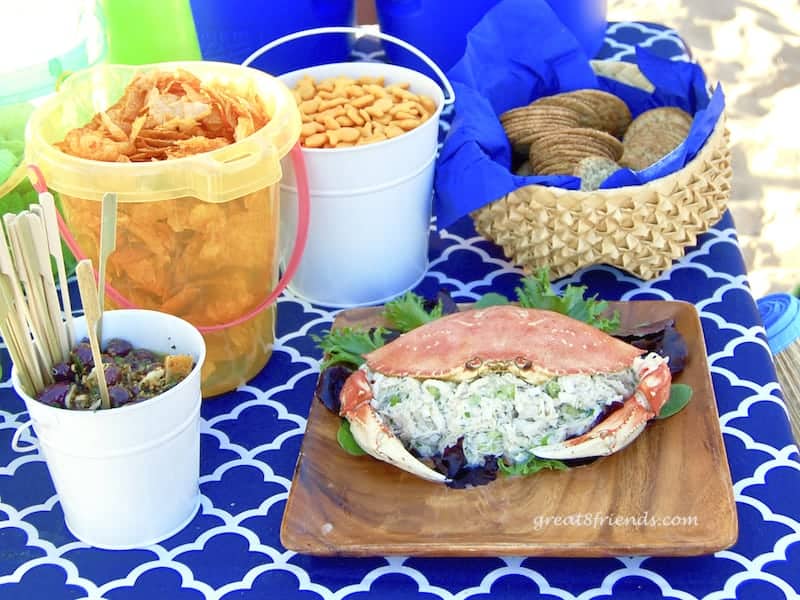 Appetizers, olives, chips, goldfish, crackers and crab salad.