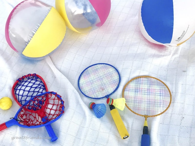 Beach toys, balls, and paddle games.