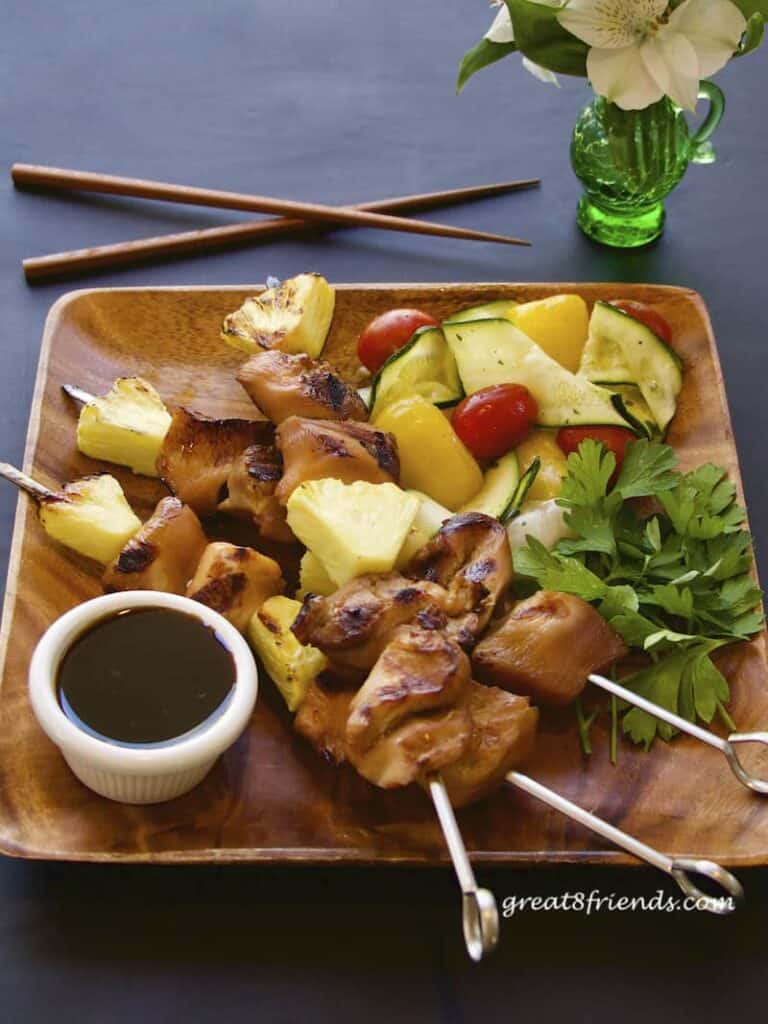 Teriyaki Chicken Skewers with chopsticks