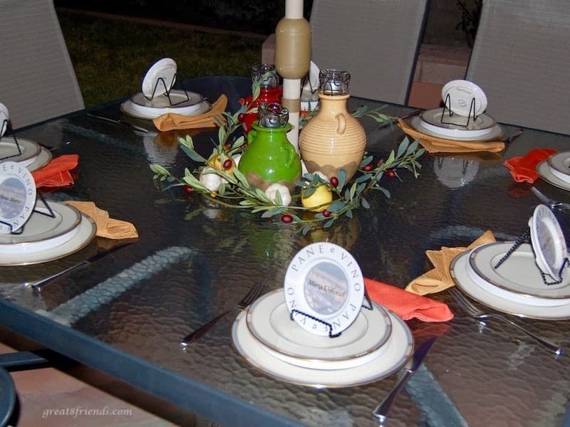 Table set for an Italian dinner on the patio table.