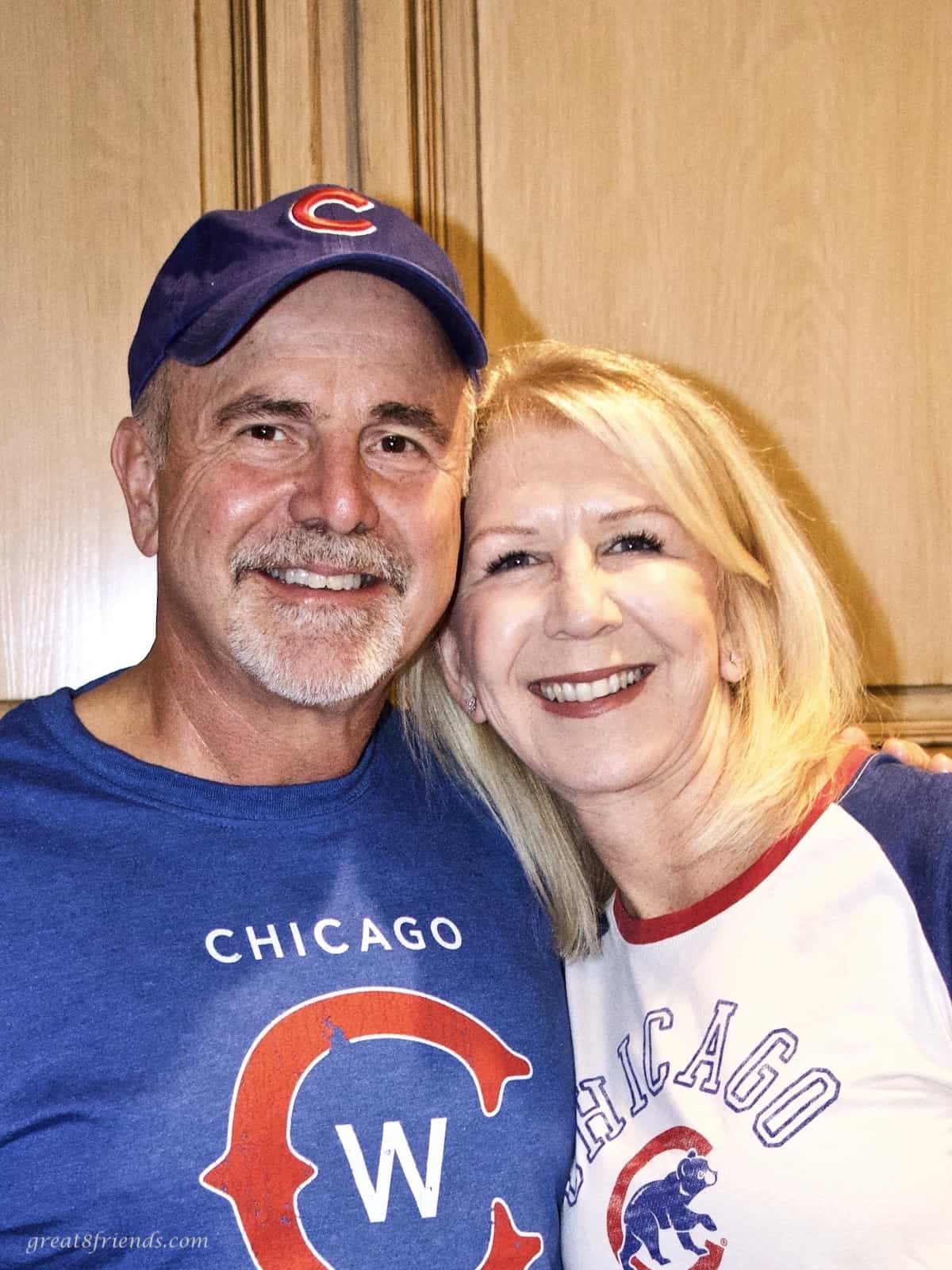 Photo of a couple wearing Chicago Cubs t-shirts.