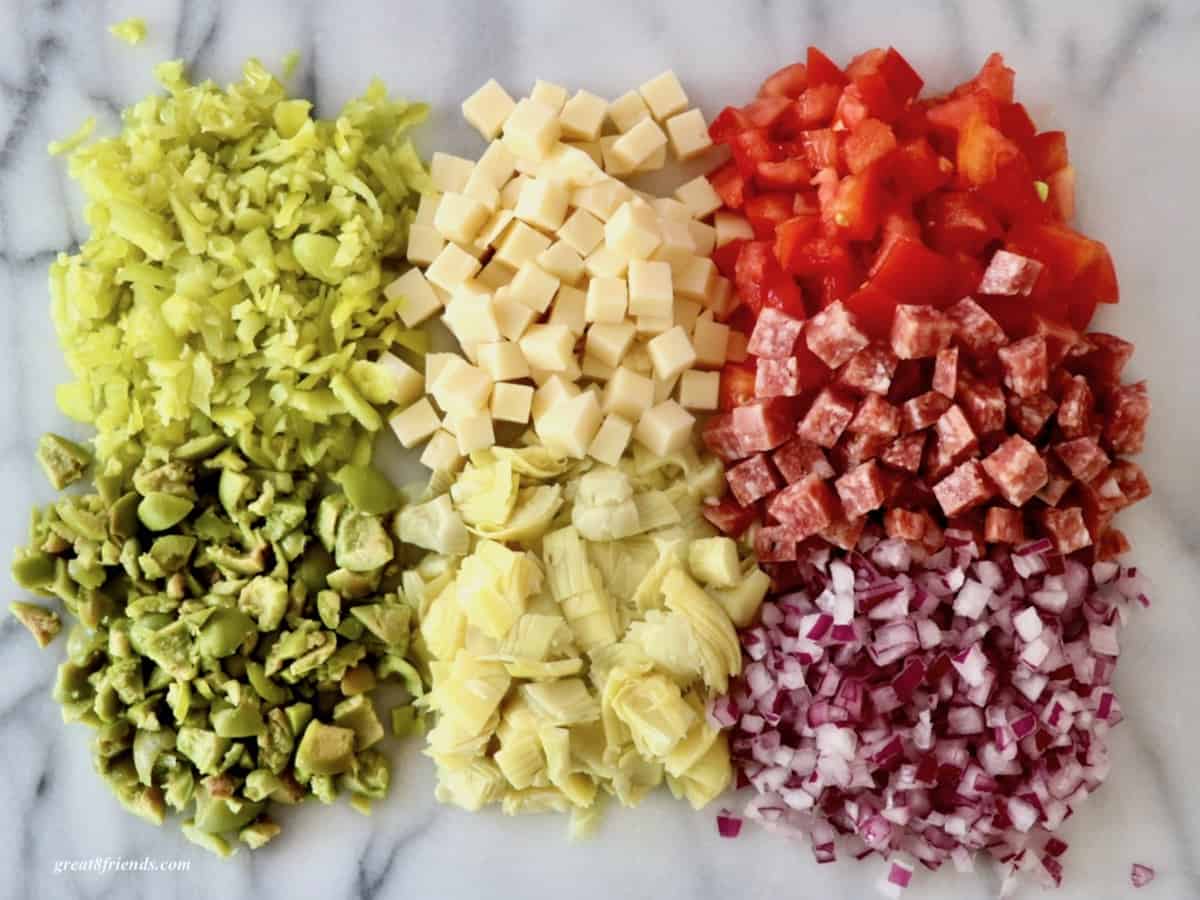 Overhead shot of ingredients chopped for salad.