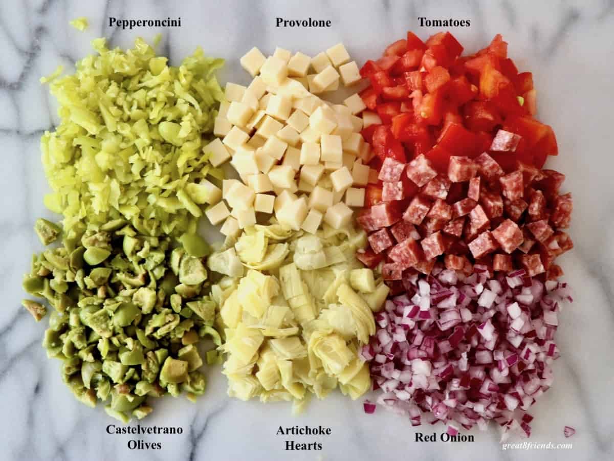 Overhead shot of ingredients chopped for salad.