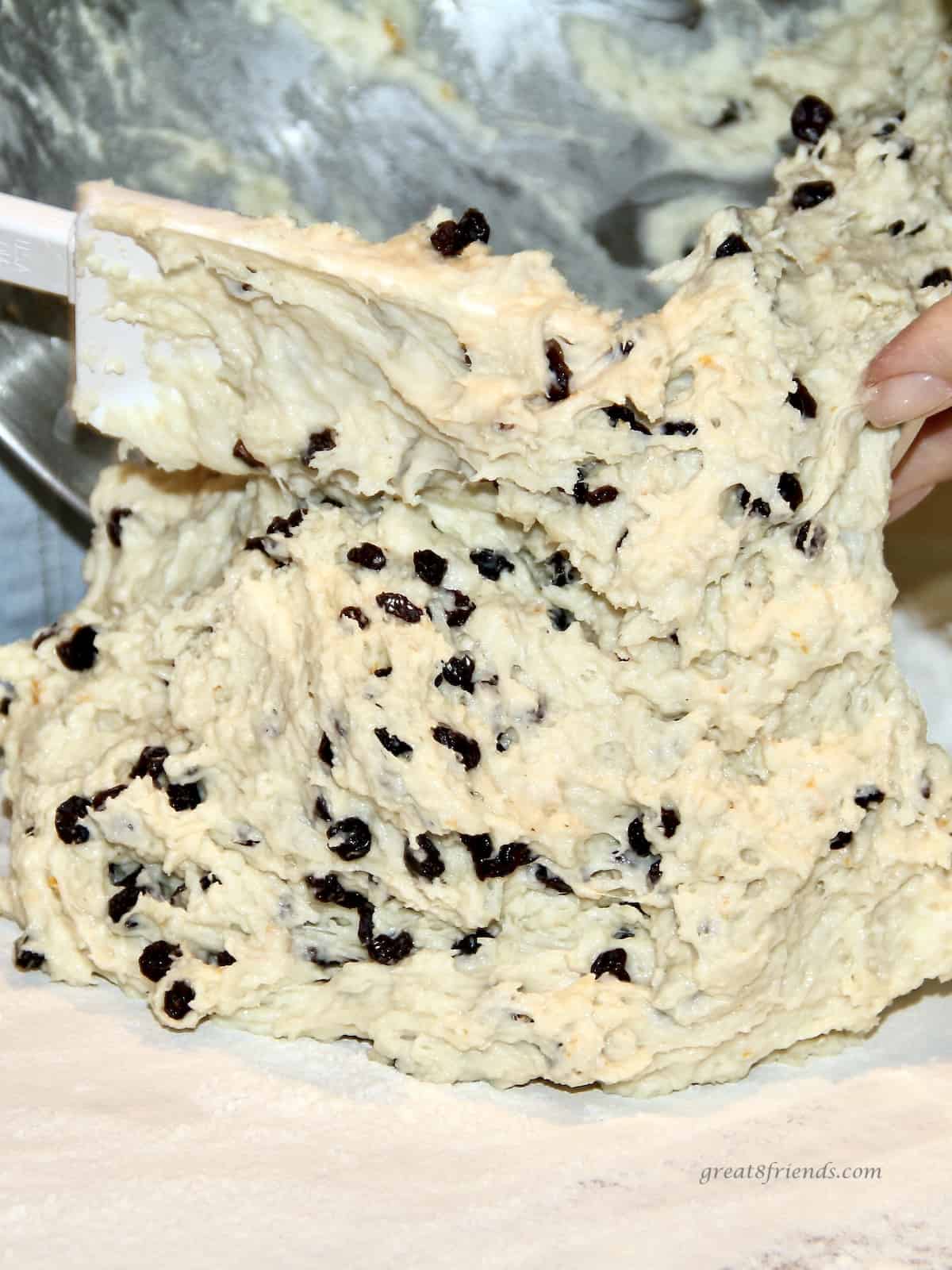 Irish Soda Bread dough being poured onto a floured counter.