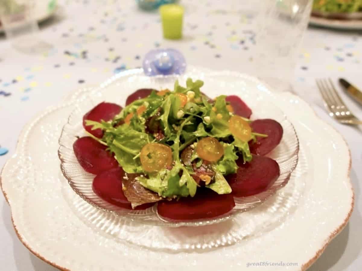 Roasted Baby Beet Salad served with Candied Kumquats and green salad.